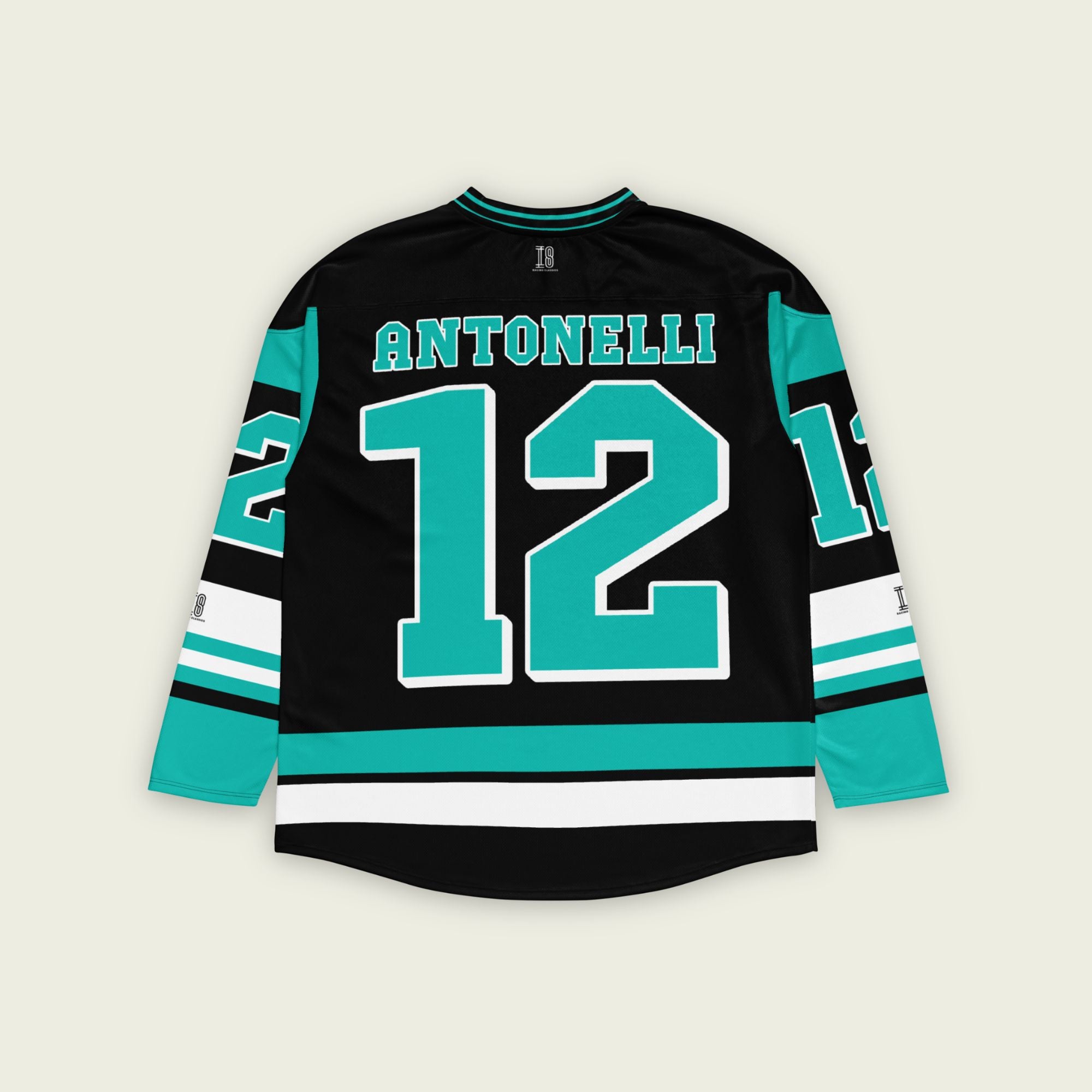 A black and turquoise hockey jersey with Andrea Kimi Antonelli's Mercedes F1 racing number 12 in turquoise on the front and back. It has the name Antonelli on the back and front in turquoise as well.