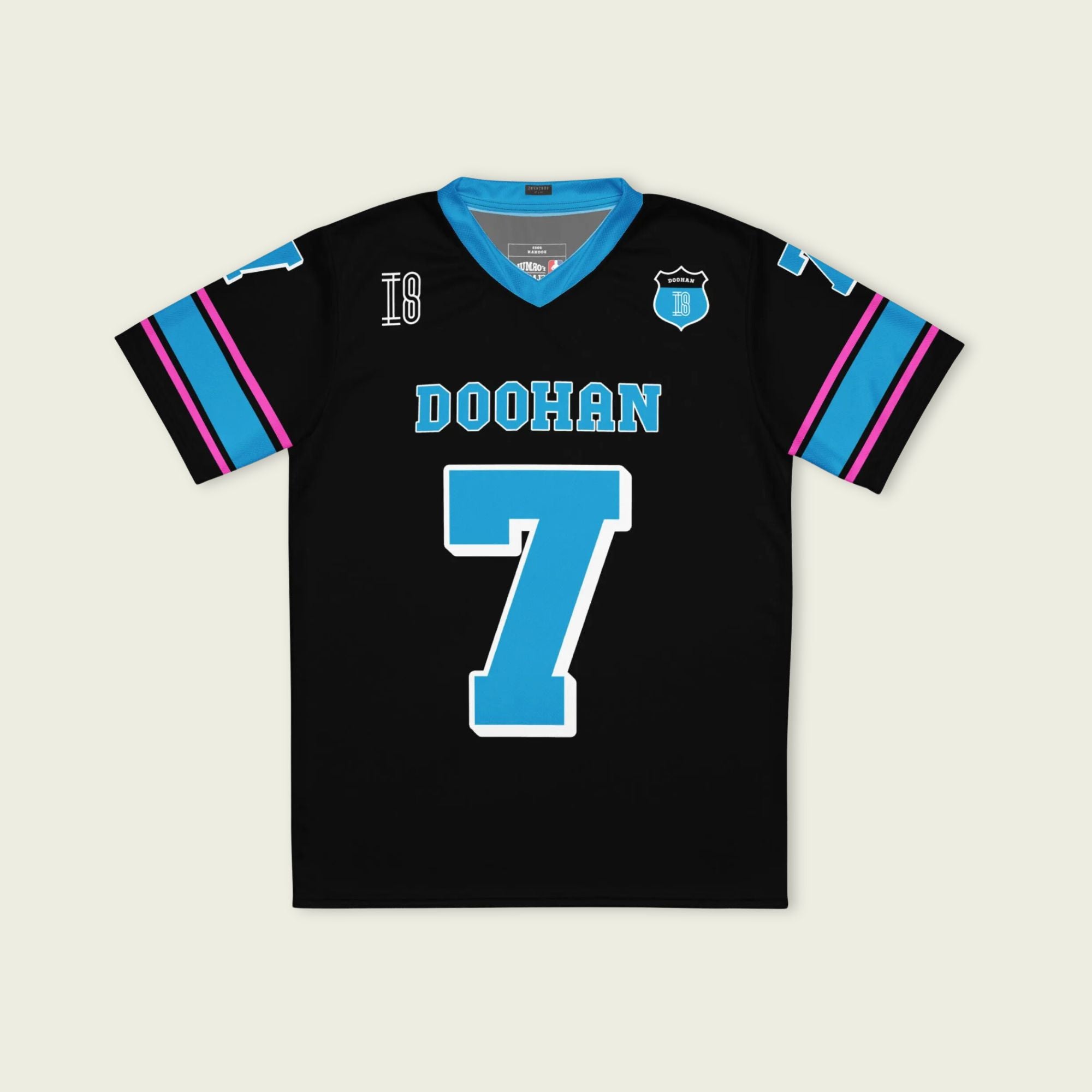 A navy blue football jersey with Jack Doohan's Alpine F1 Racing number 7 on the front and back.