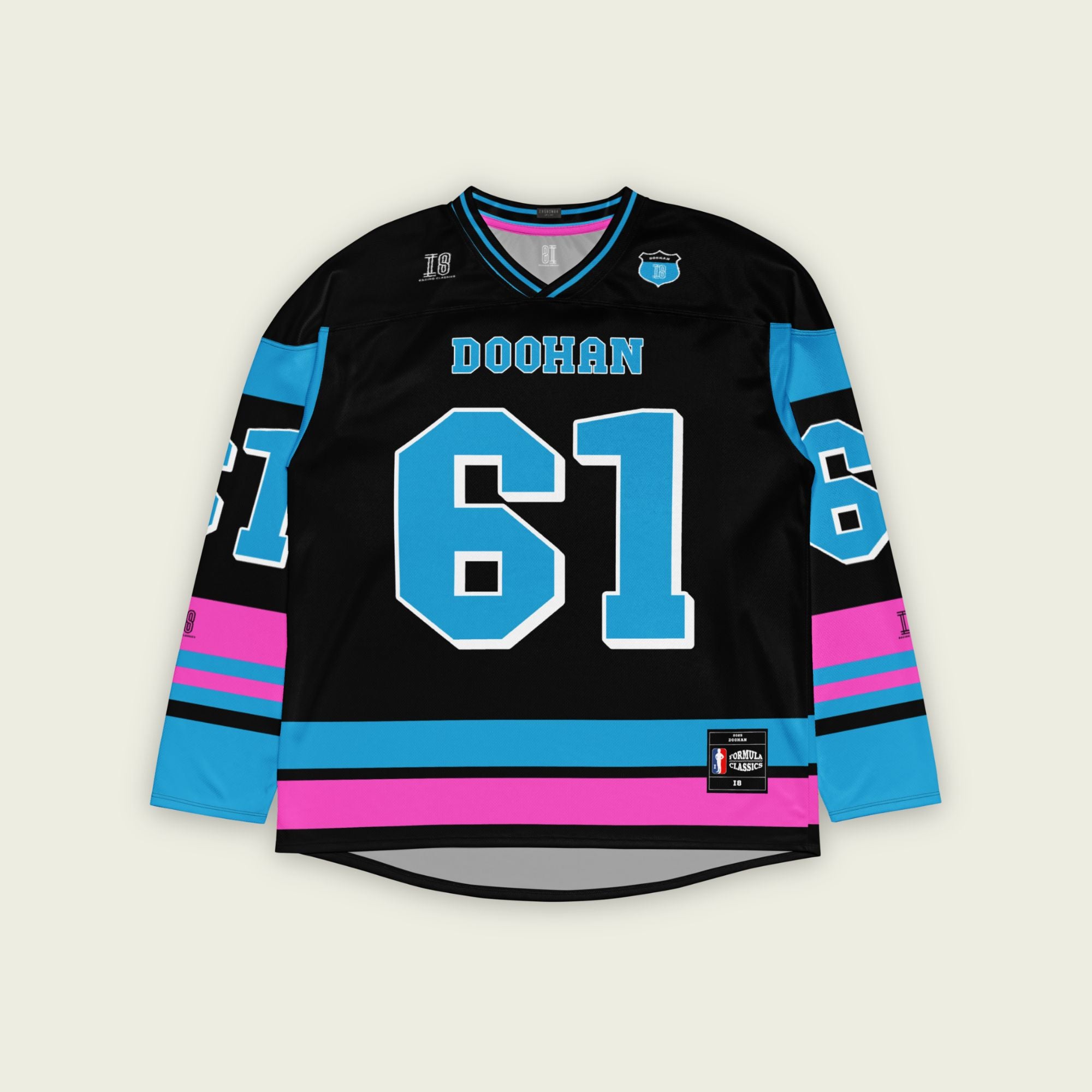 A black, blue, and pink hockey jersey with Jack Doohan's F1 2025 Alpine racing number 61 on the front and back in blue. The name Doohan in blue is on the front and back.
