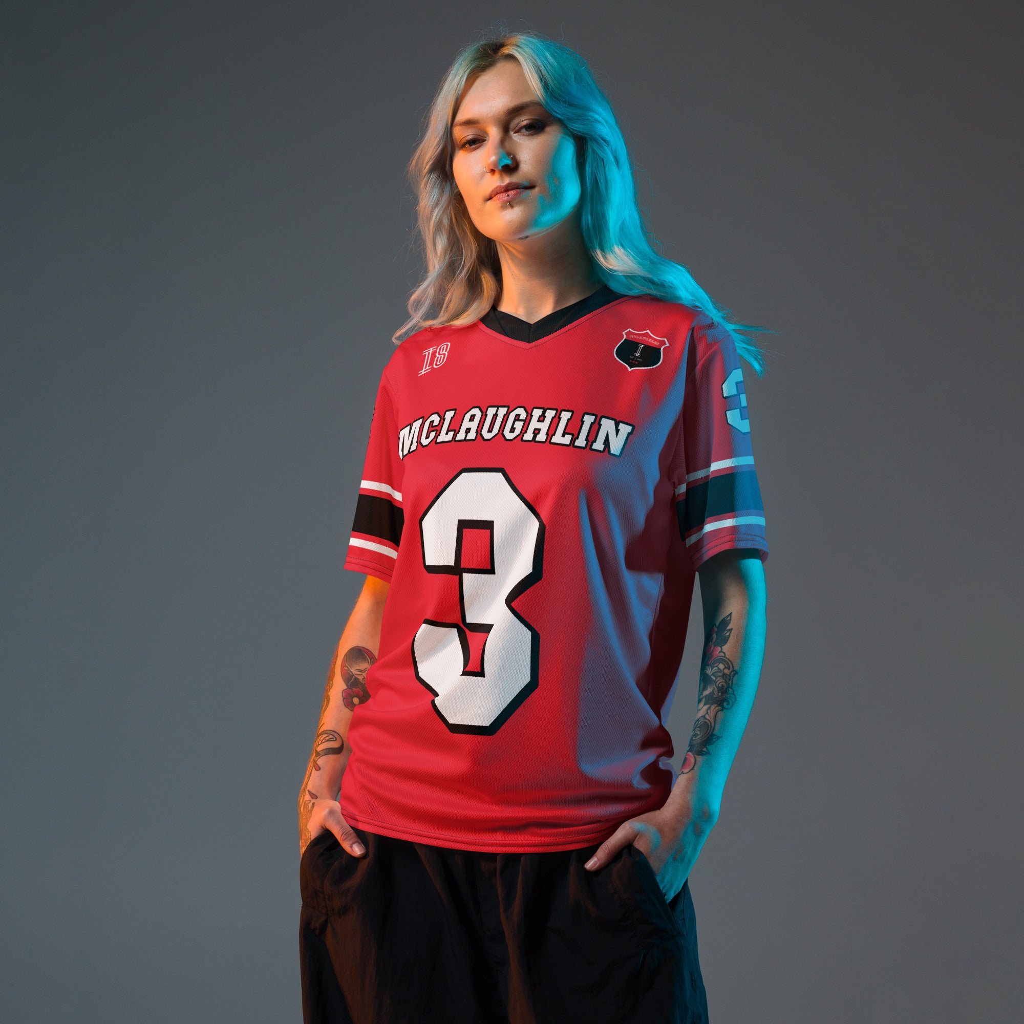A red football jersey with Scott McLaughlin's team Penske Indycar Racing number 3 on the front and back.